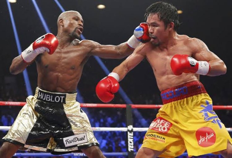 Floyd Mayweather fights Manny Pacquiao in 2017. /NEW YORK TIMES